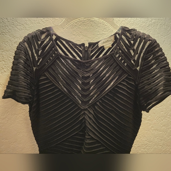 Like new- Calvin Klein fitted black sheer overlay dress. - Picture 2 of 4
